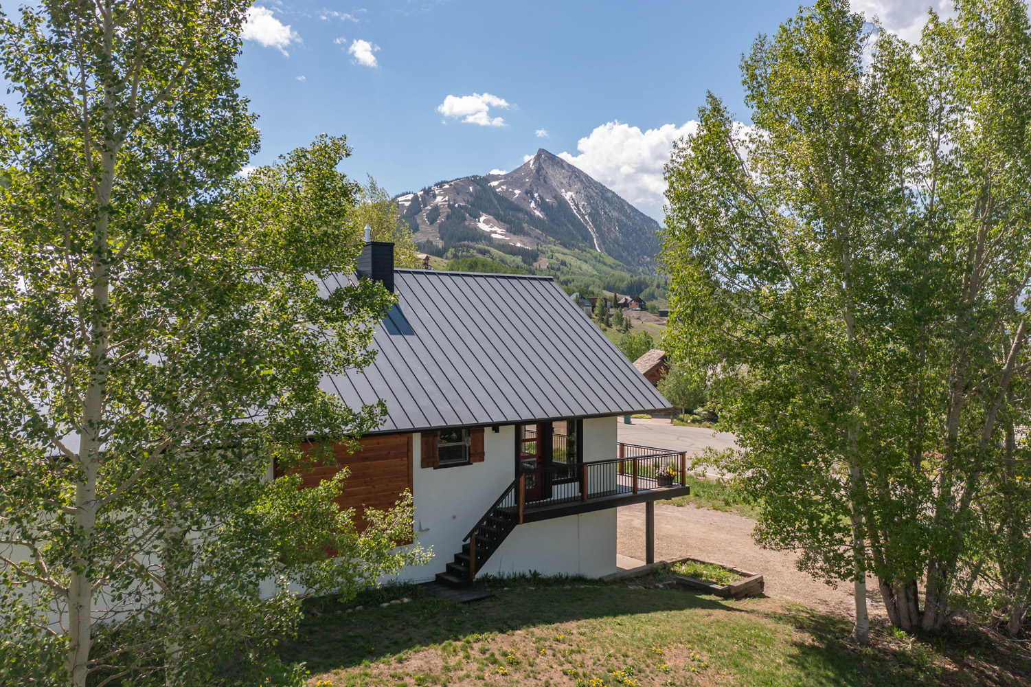 29 Belleview Drive Mt. Crested Butte, Colorado - back of property drone mountain view